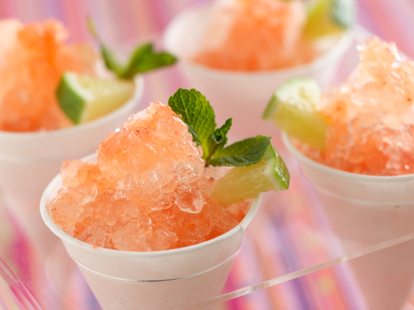 Strawberry snow cone- crushed ice, a splash of lemon juice, and