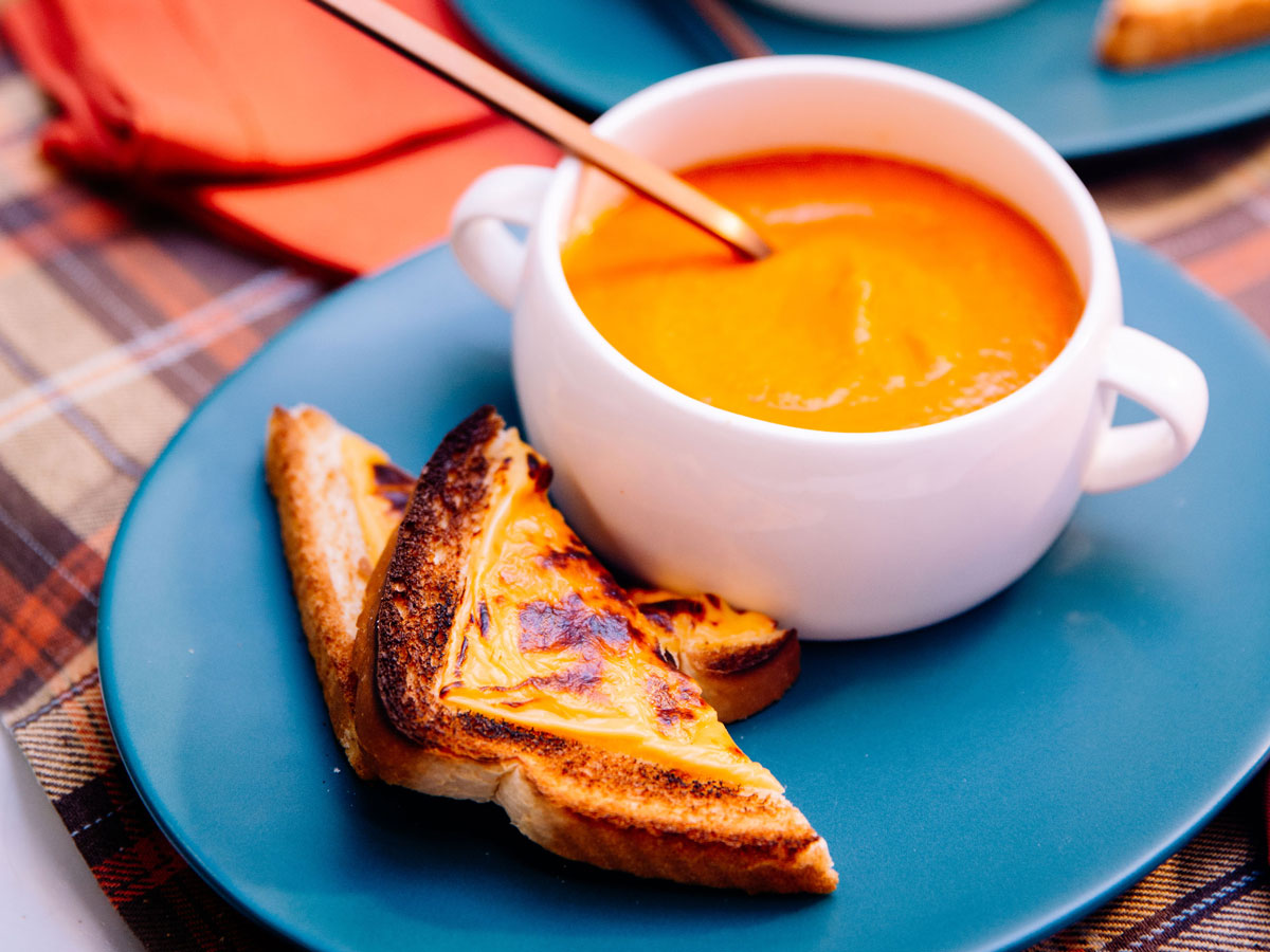 https://www.foodnetwork.com/content/dam/images/food/fullset/2020/01/02/KC2308_roasted-tomato-soup-with-broiled-cheese-toast_s4x3.jpg